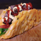 Image for article titled This french fry burger taco proves that happiness comes in many forms